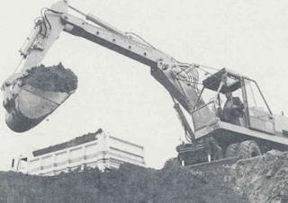 Excavatrice sur chenilles Caterpillar 214