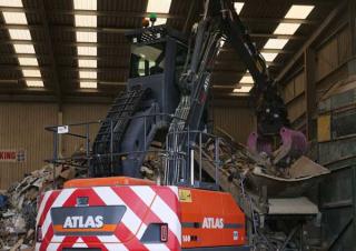 Excavatrice sur pneus Atlas 160 MH