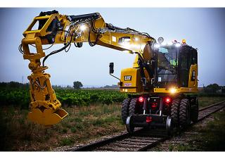 Excavatrice sur pneus Caterpillar M323F 