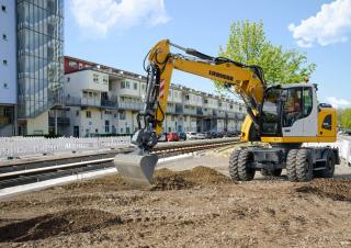 Excavatrice sur pneus Liebherr A 914 Compact Litronic