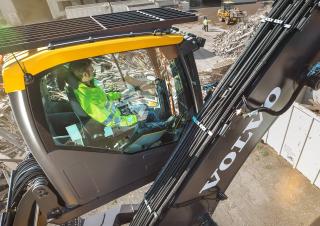 Excavatrice sur pneus Volvo EW240E MH