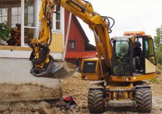 Excavatrice sur pneus Hydrema M 1400 C Serie 2