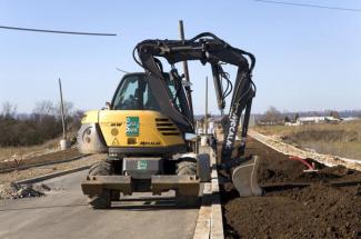 Excavatrice sur pneus Mecalac 714 MW e