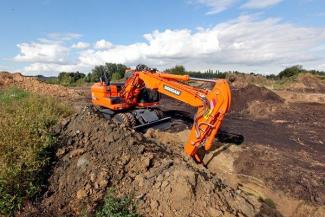 Excavatrice sur pneus Doosan DX160W-3