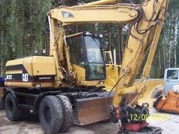 Excavatrice sur pneus Caterpillar M 315 Mono
