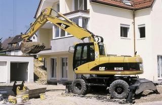Excavatrice sur pneus Caterpillar M 316 C VAH