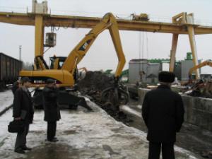 Excavatrice sur pneus Caterpillar M 318 C MH