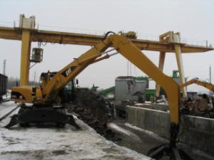 Excavatrice sur pneus Caterpillar M 318 C MH