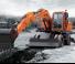 Excavatrice sur pneus Doosan DX140W