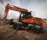 Excavatrice sur pneus Doosan DX210W-5