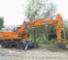 Excavatrice sur pneus Doosan DX210W