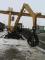 Excavatrice sur pneus Caterpillar M 318 C MH