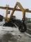 Excavatrice sur pneus Caterpillar M 318 C MH