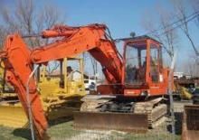 Excavatrice sur pneus FAI 1000