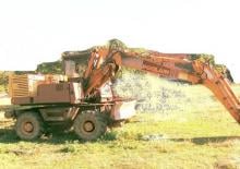 Excavatrice sur pneus Case Poclain 688 PL