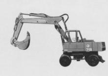 Excavatrice sur pneus Fuchs 713 M