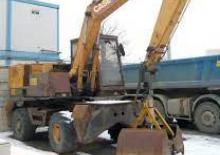 Excavatrice sur pneus Case Poclain 888 B P2A