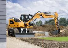 Excavatrice sur pneus Liebherr A 910 Compact Litronic G6.1