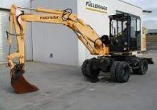 Excavatrice sur pneus Macmoter BW 75