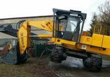 Excavatrice sur pneus Unex DH 12.1 M