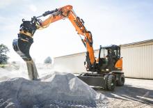 Excavatrice sur pneus Develon DX100W-7 