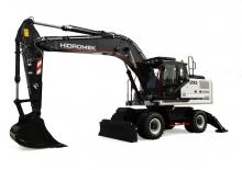 Excavatrice sur pneus Hidromek HMK 210 W