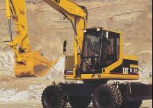 Excavatrice sur pneus Caterpillar M312