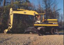 Excavatrice sur pneus Caterpillar M318