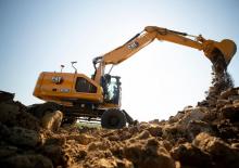 Excavatrice sur pneus Caterpillar M320