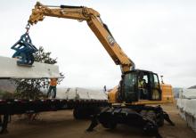 Excavatrice sur pneus Caterpillar M322