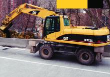 Excavatrice sur pneus Caterpillar M322C