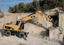 Excavatrice sur pneus Caterpillar M322D