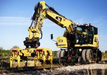 Excavatrice sur pneus Caterpillar M323F 