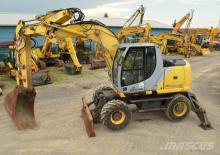 Excavatrice sur pneus New Holland MH Plus