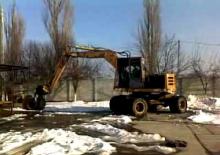 Excavatrice sur pneus PROMEX P 502