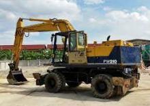 Excavatrice sur pneus Komatsu PW210-1