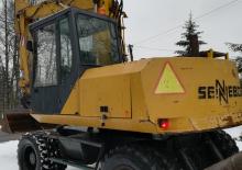 Excavatrice sur pneus Sennebogen SM 13 C