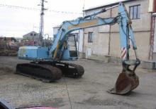Excavatrice sur pneus Unex SM 15 SL