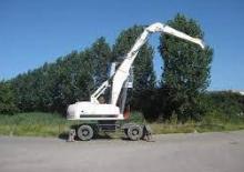 Excavatrice sur pneus Atlas TM 270
