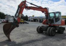 Excavatrice sur pneus Atlas TW 140