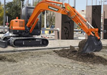 Excavatrice sur pneus Doosan DX 55