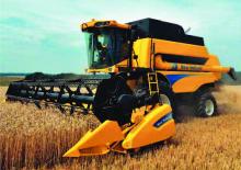Moissonneuse-batteuses New Holland CSX 7080 Laterale