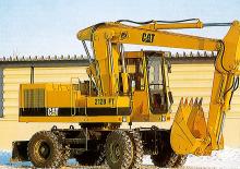 Excavatrice sur pneus Caterpillar 212B