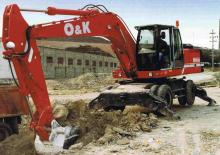 Excavatrice sur pneus O&K MH 6 HD