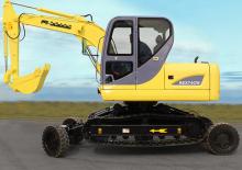 Excavatrice sur pneus RHINO REX74CW