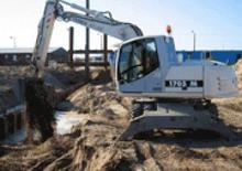 Excavatrice sur pneus Atlas 1104 M