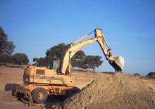 Excavatrice sur pneus Case Poclain 1188 PM 2A