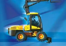 Excavatrice sur pneus Mecalac 12 MXT