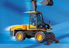 Excavatrice sur pneus Mecalac 14 MBX