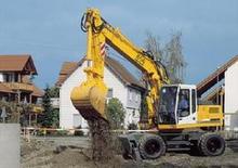 Excavatrice sur pneus Liebherr A 914 Litronic